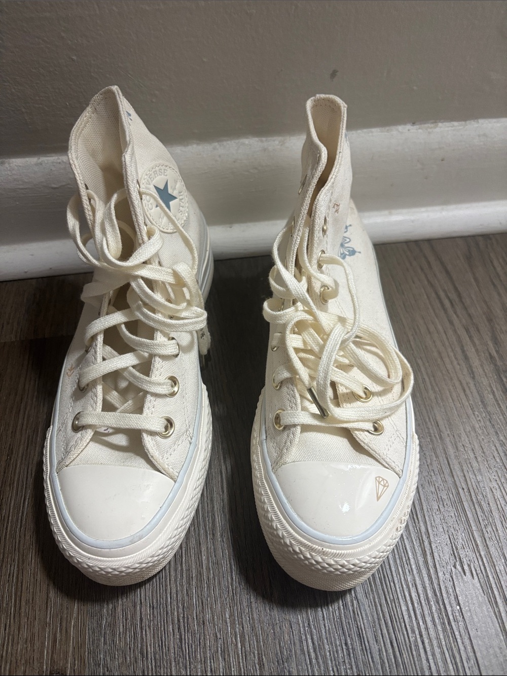 Converse Women’s High-Top Canvas Sneakers in Off-White with Light Blue Star
